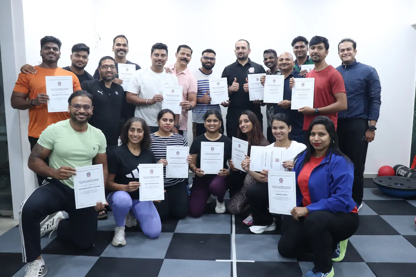 IFSI students displaying their course certificates